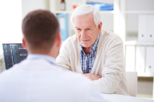 Senior patient listening to the doctor