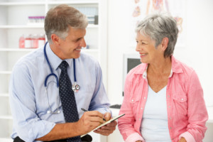 Senior woman talking with her doctor